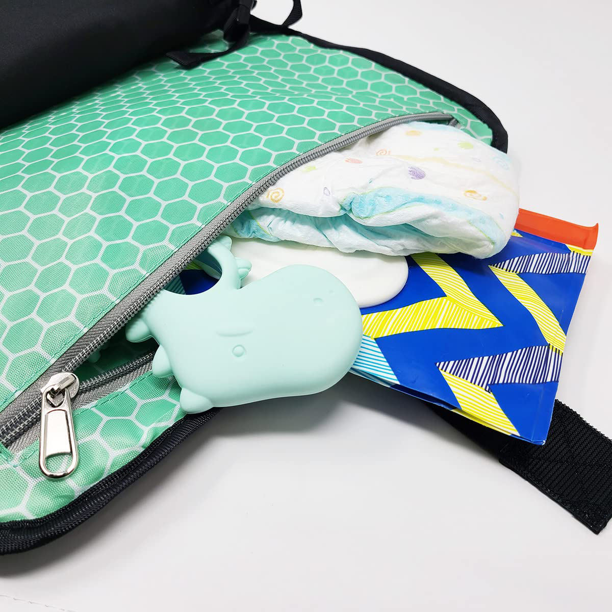 Nuevo diseño, bolsa de pañales plegable, cambiador de pañales, cambiador de bebé, almohadilla de viaje, embrague de pañales